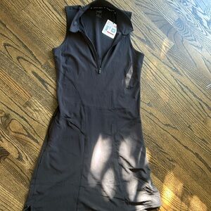 XS Puma golf dress new w/tags. Black polyester/elastine
